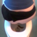 An overhead camera captures a woman pooping on a toilet with a voyeuristic flavor. Two scenes! Full audio included.